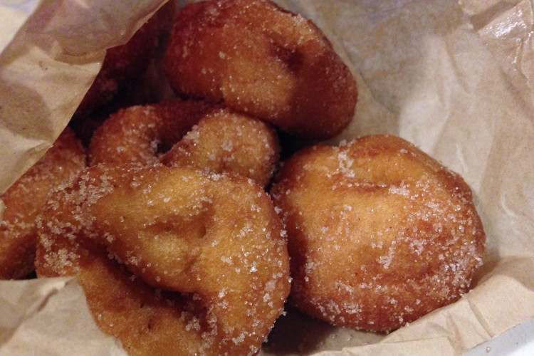 The scent of crunchy, hot, so-fresh-you-watched-them-made mini donuts warms the air. (From Cin City Donuts.)